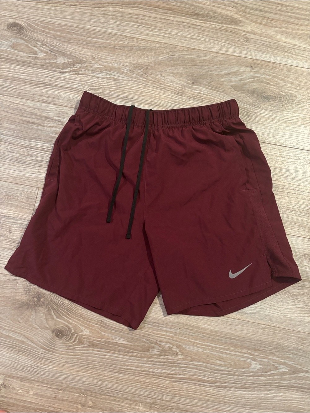 Nike Men's Burgundy Athletic Shorts with Reflective Swoosh